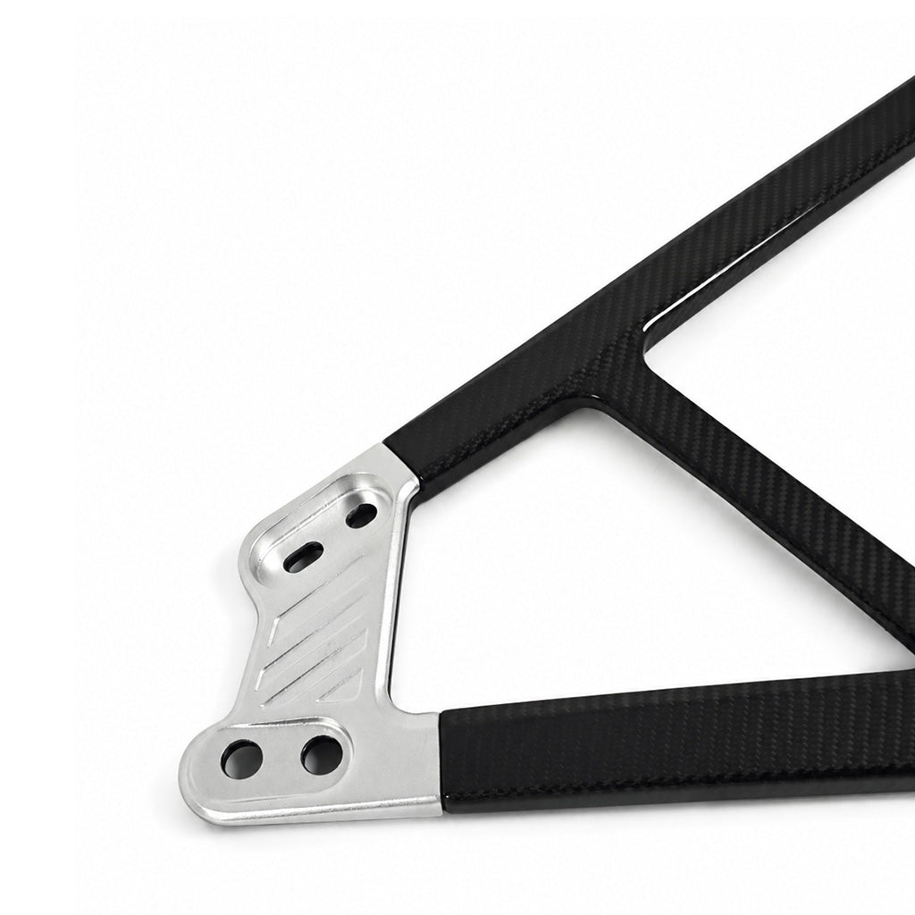 Silver machined aluminum CNC end bracket detail on the BMW G8X CSL style carbon fiber engine bay strut bar