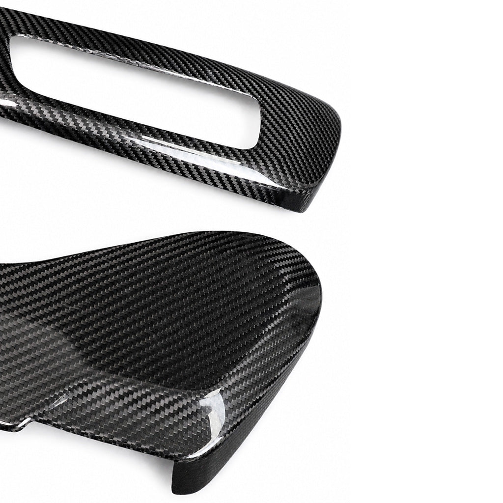 BMW G8X M2 M3 M4 Dry Carbon Side Seat Cover pair close-up – 2x2 twill weave texture detail with cutout frame edge visible, white background