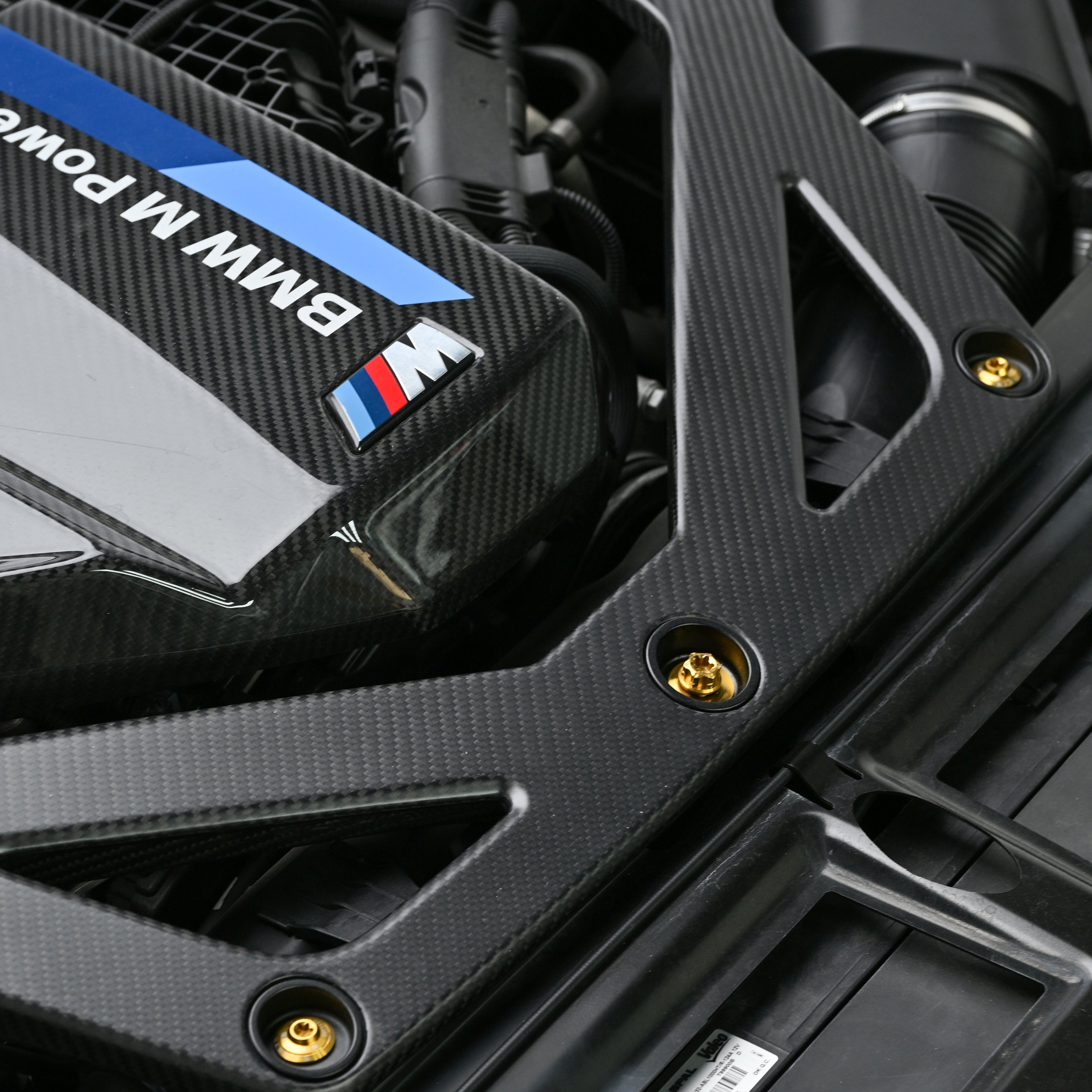 CarbonXtreme CSL style carbon fiber engine bay strut bar, carbon weave detail
