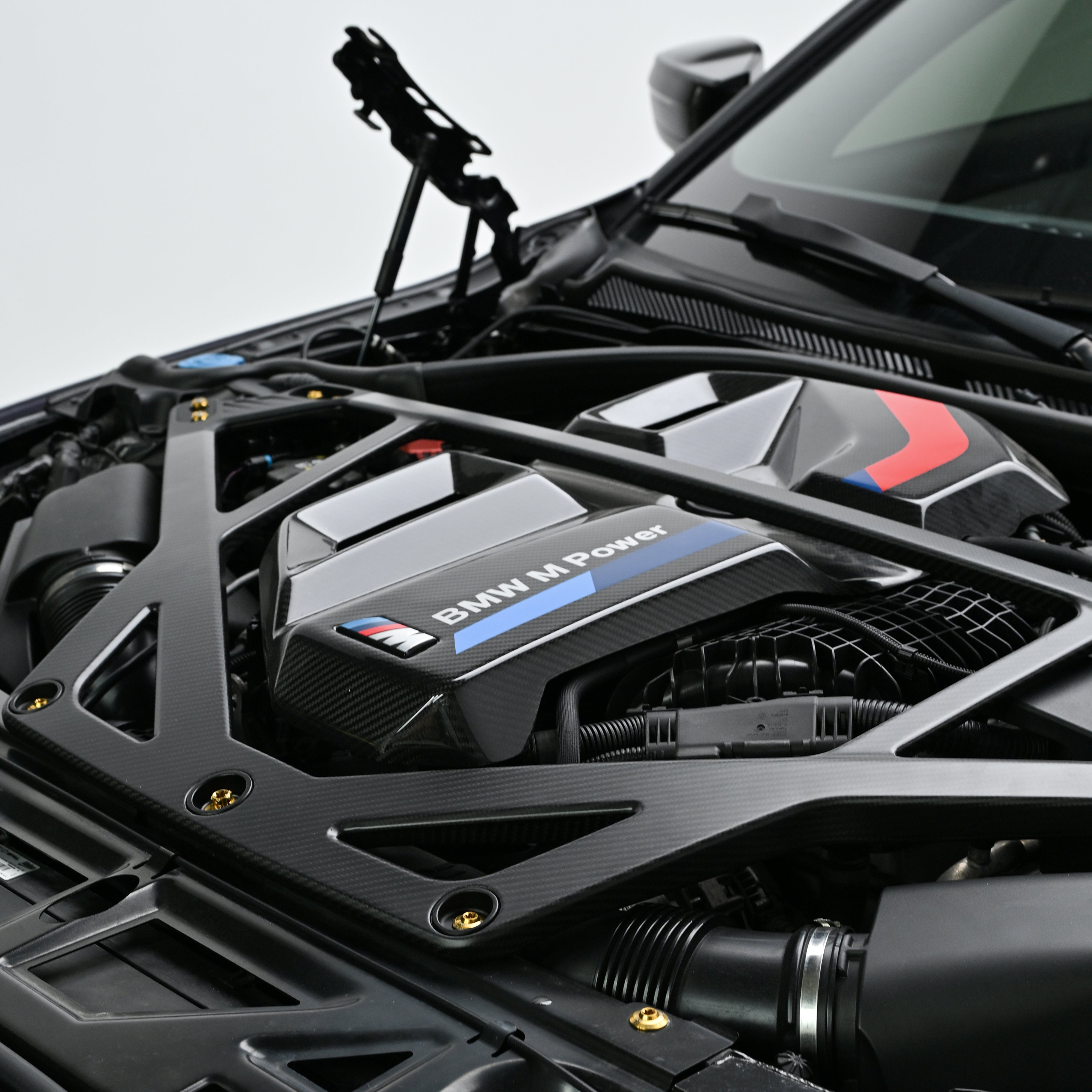 CarbonXtreme BMW M2 M3 M4 CSL style carbon fiber engine bay strut bar