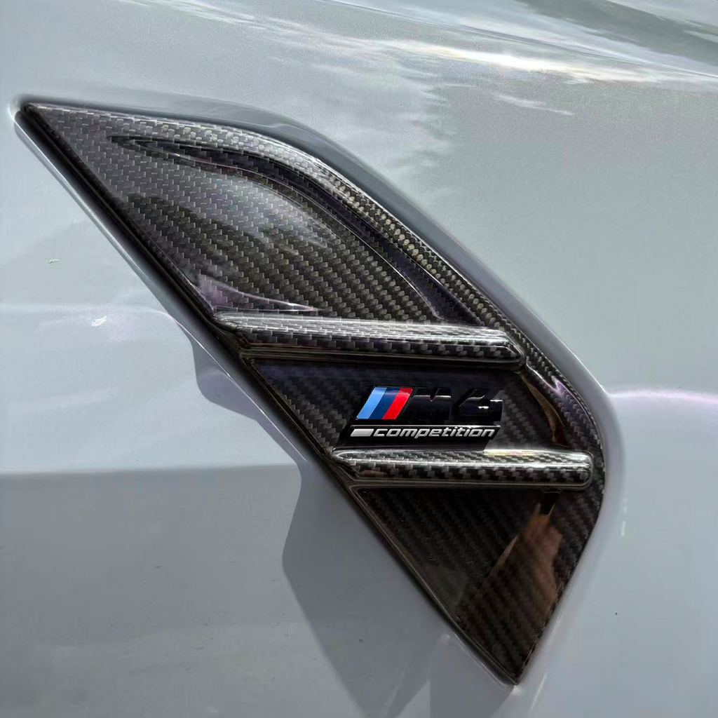BMW G80 M3 MP Style carbon fiber side fenders with vented aerodynamic design by CarbonXtreme