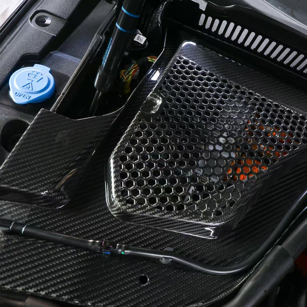 BMW G90 M5 full carbon fiber engine bay set with mesh, battery cover, radiator cap, and engine shroud by CarbonXtreme