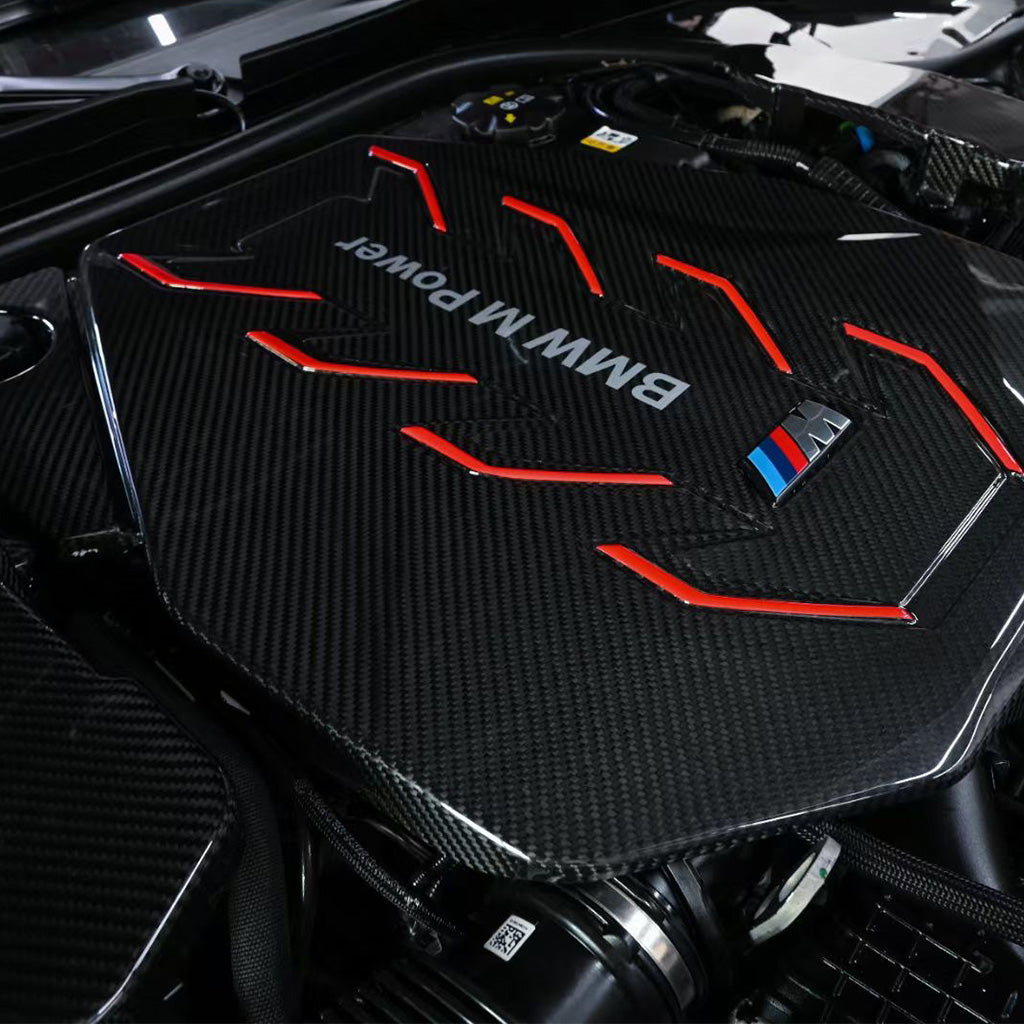 BMW G90 M5 full carbon fiber engine bay set with mesh, battery cover, radiator cap, and engine shroud by CarbonXtreme