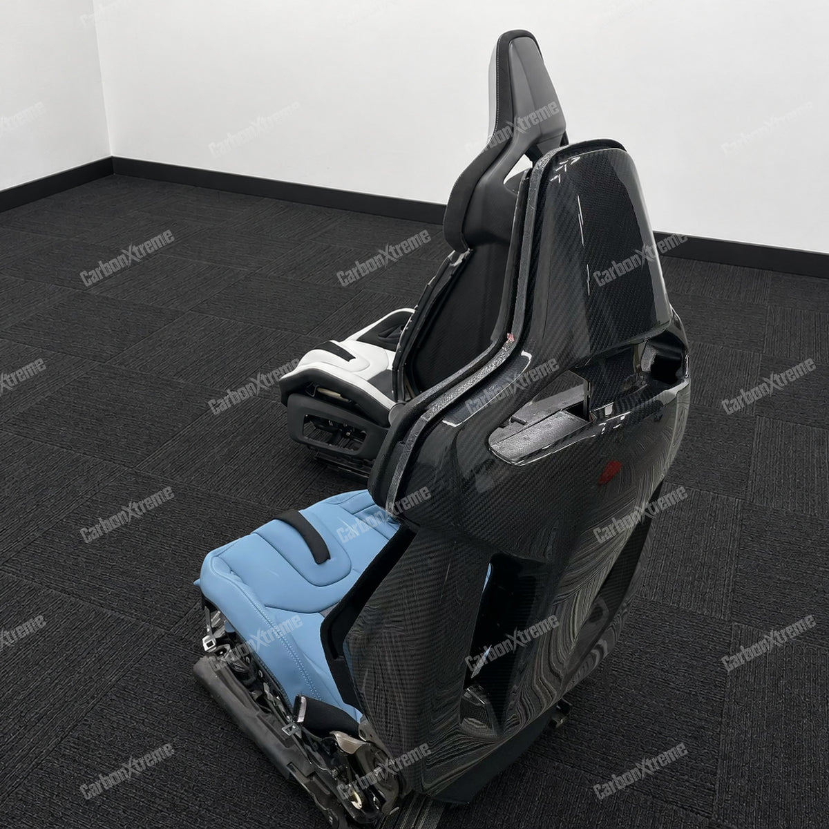 BMW M carbon fiber bucket seat, rear view of the carbon fiber backrest with blue leather cushion