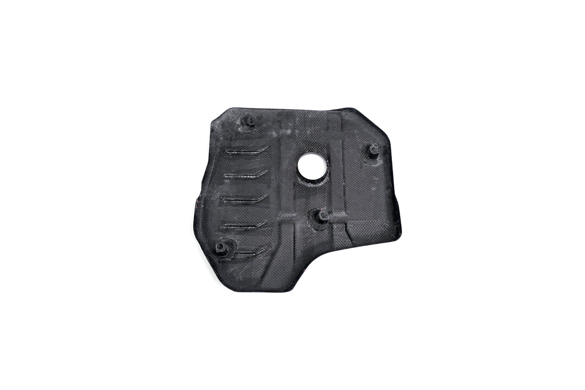 BMW G22 4 Series B48 carbon fiber engine cover is shown from the underside with mounting points and an oil opening.