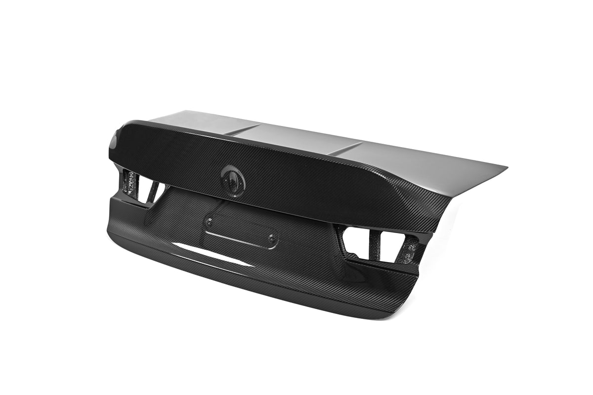 BMW G80 M3 CSL style carbon fiber trunk lid, three-quarter view of the ducktail profile