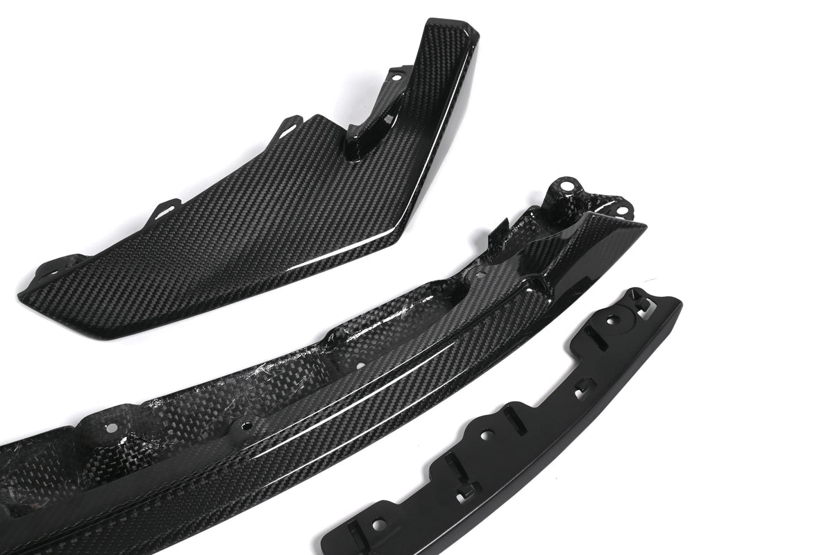 Carbon fiber weave detail on the CSL style front lip and corner splitter