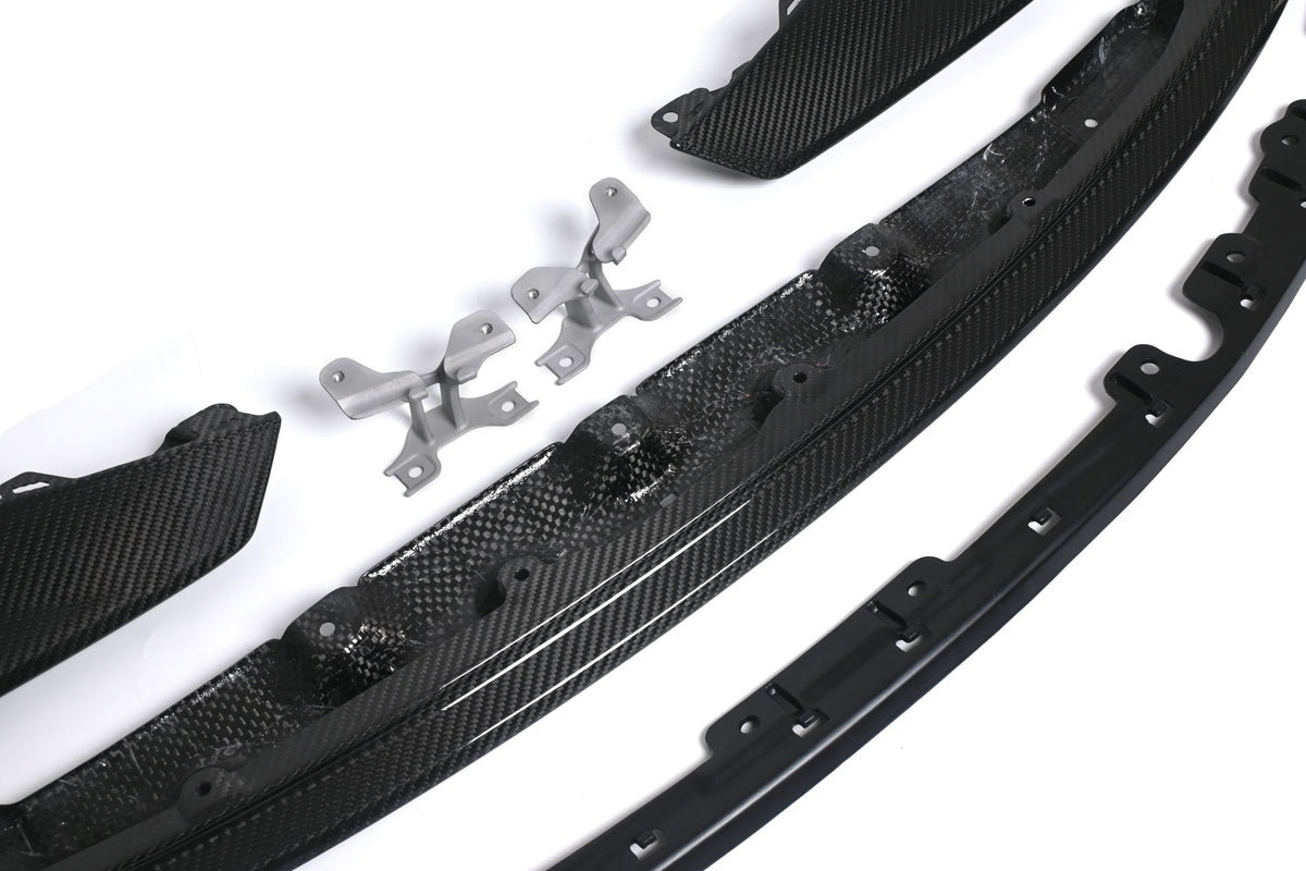 Metal mounting brackets supplied with the CSL style carbon fiber front lip