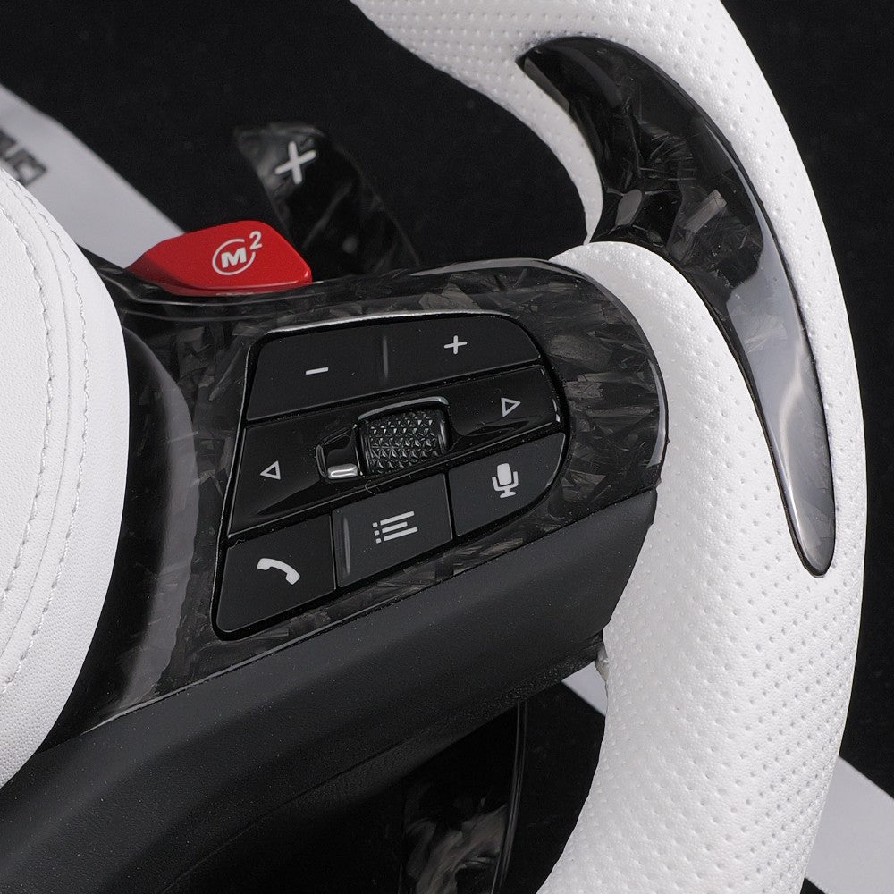 Red M2 button fitted next to the right-hand steering wheel controls