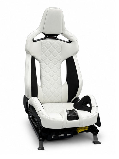 BMW M Carbon Fiber Bucket Seats Bespoke Leather, M8-style diamond quilting with carbon fiber shell, three-quarter view