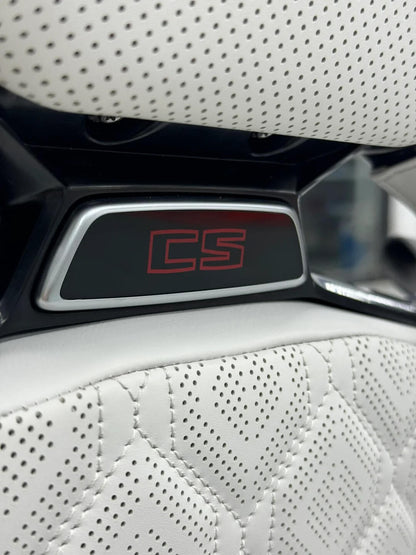BMW M Carbon Fiber Bucket Seat illuminated headrest emblem, macro detail