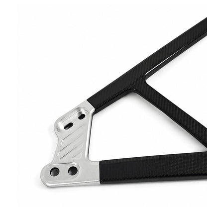 Silver machined aluminum CNC end bracket detail on the BMW G8X CSL style carbon fiber engine bay strut bar