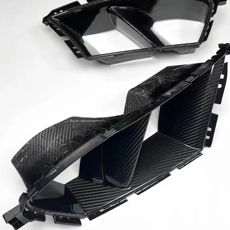 BMW G80 M3 G82 M4 MP Style carbon fiber front bumper air ducts by CarbonXtreme
