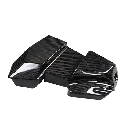 BMW G8X M2 M3 M4 OEM style dry carbon fiber ECU battery terminal cover by CarbonXtreme

