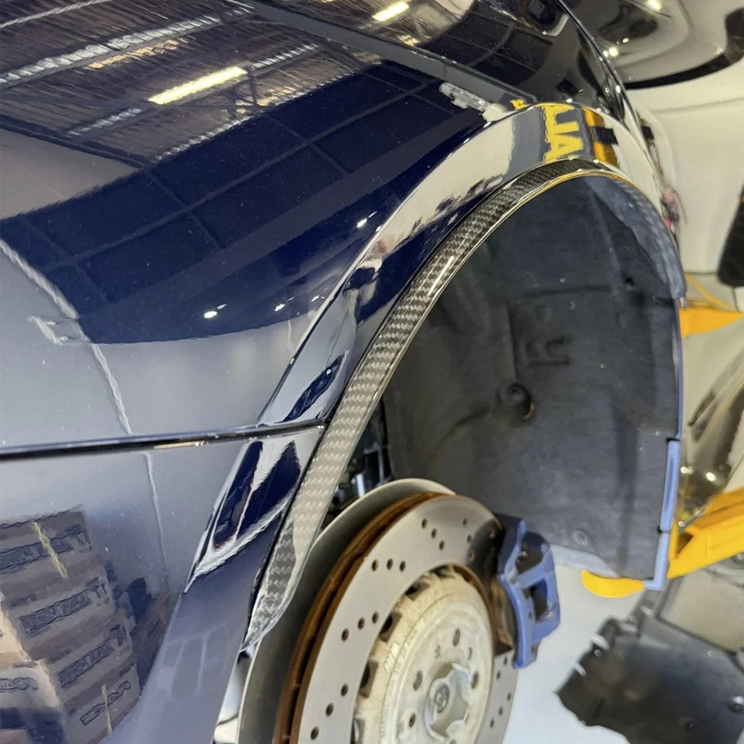 BMW G80 M3 carbon fiber wheel arch trim with OE mount or 3M adhesive installation by CarbonXtreme
