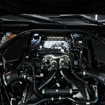 BMW G90 M5 full carbon fiber engine bay set with mesh, battery cover, radiator cap, and engine shroud by CarbonXtreme