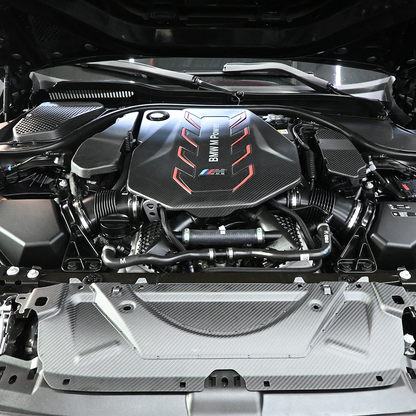 BMW G90 M5 full carbon fiber engine bay set with mesh, battery cover, radiator cap, and engine shroud by CarbonXtreme