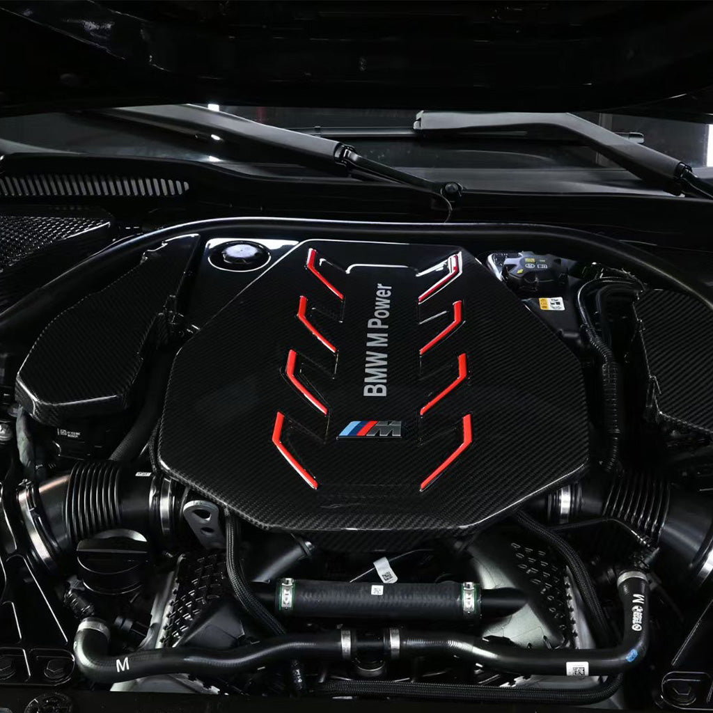 BMW G90 M5 full carbon fiber engine bay set with mesh, battery cover, radiator cap, and engine shroud by CarbonXtreme