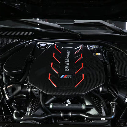 BMW G90 M5 full carbon fiber engine bay set with mesh, battery cover, radiator cap, and engine shroud by CarbonXtreme