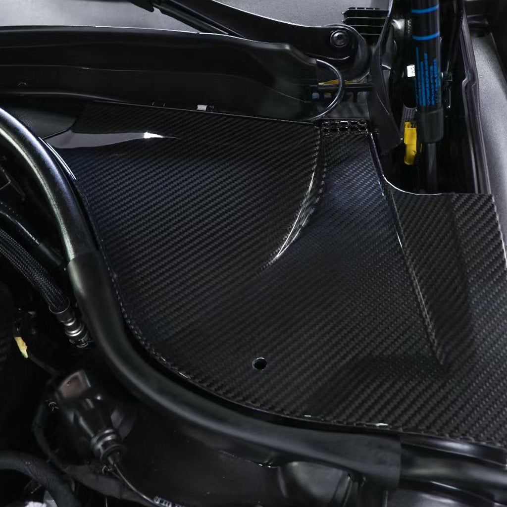 BMW G90 M5 full carbon fiber engine bay set with mesh, battery cover, radiator cap, and engine shroud by CarbonXtreme