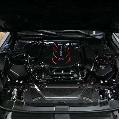 BMW G90 M5 full carbon fiber engine bay set with mesh, battery cover, radiator cap, and engine shroud by CarbonXtreme