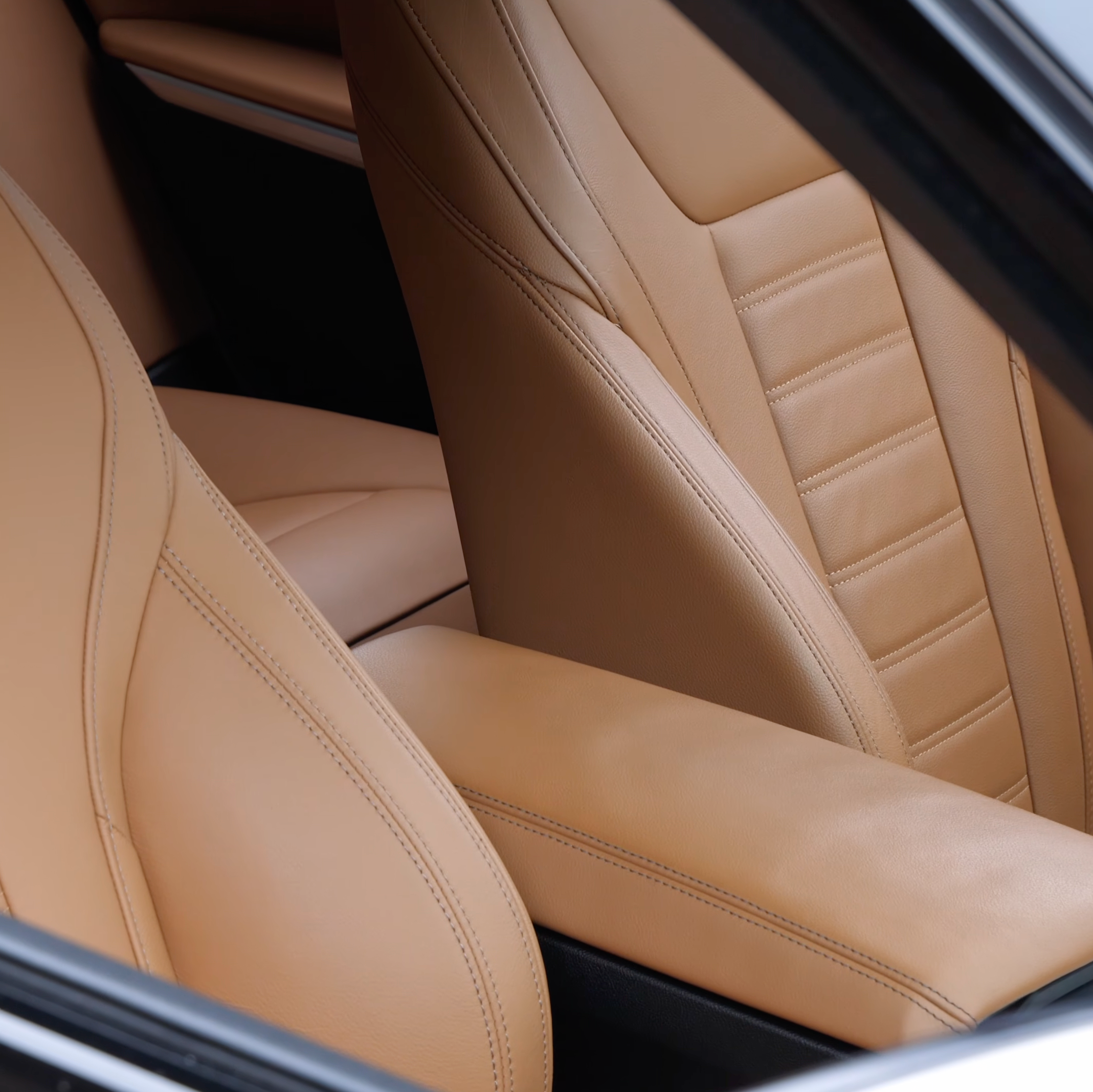 BMW Cognac Merino leather interior color sample for G8X M3 M4 center armrest cover | CarbonXtreme