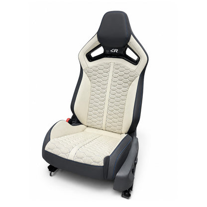 Audi RS Sport Bucket Seat – cream and charcoal two-tone, blue stitching, honeycomb-quilted white center panel and R badge