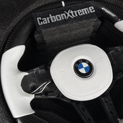 White leather grip and white leather airbag cover on the custom carbon fiber steering wheel
