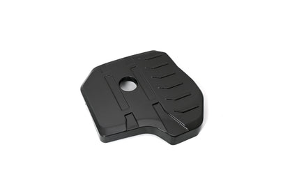 BMW G22 4 Series B48 carbon fiber engine cover is angled on white with a round oil opening and raised ribs.