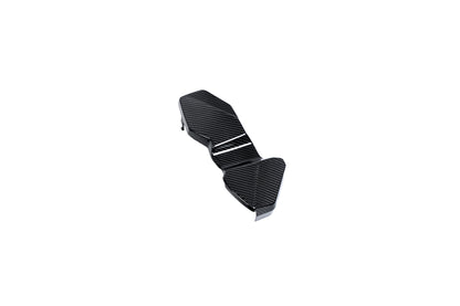 BMW G22 4 Series carbon fiber ECU battery terminal cover is shown diagonally with a narrow central step.