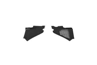 BMW G22 4 Series carbon fiber engine bay corner panels sit side by side with honeycomb mesh on the right panel.