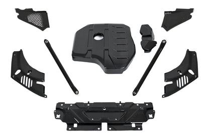 BMW G22 4 Series carbon fiber engine bay kit laid out on white with the engine cover, ECU battery terminal cover, headlight cover panels, corner panels, slam panel cover and strut brace