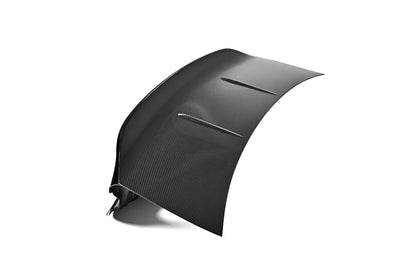 Top surface of the BMW G80 M3 CSL style carbon fiber trunk lid in gloss carbon weave