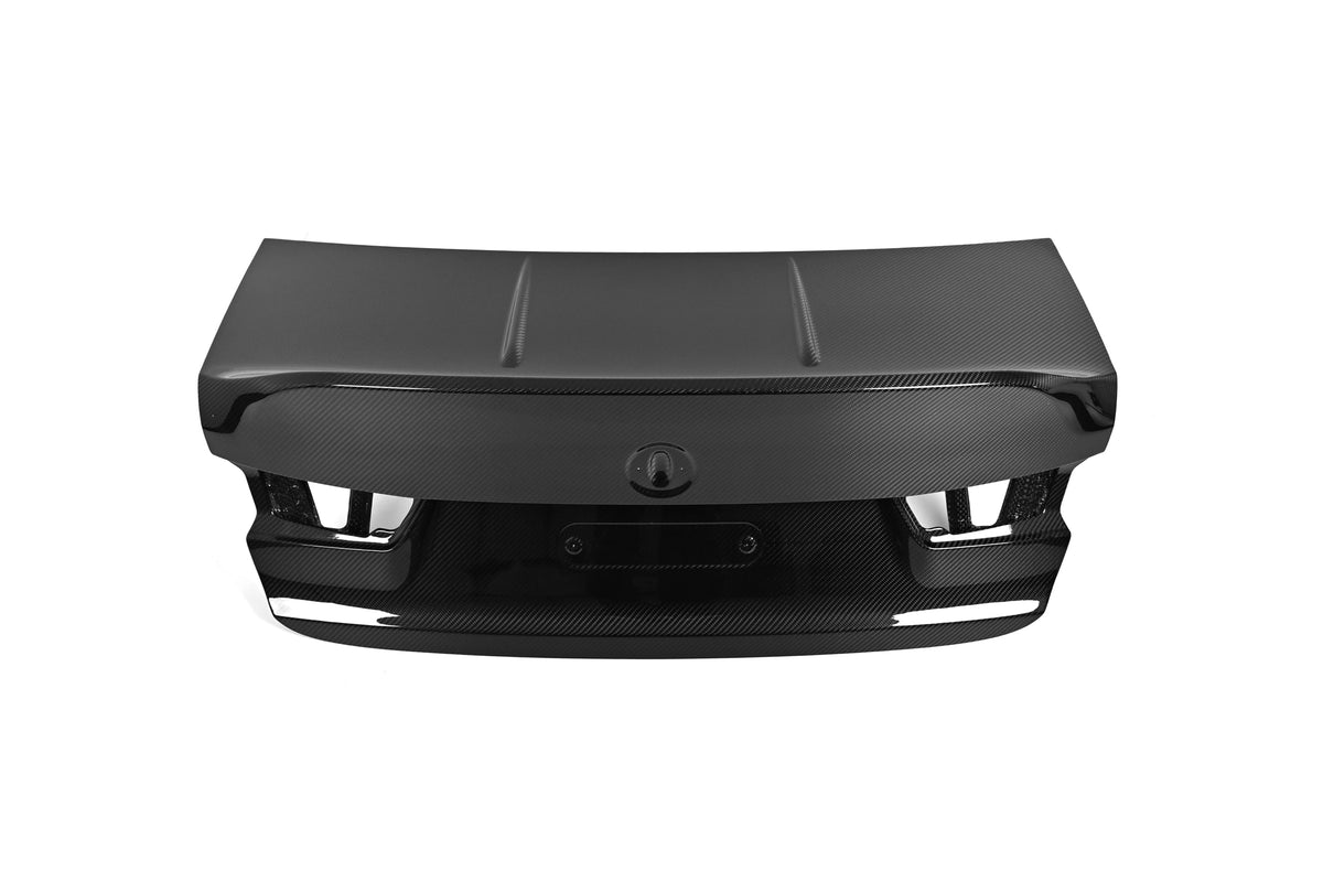 BMW G80 M3 CSL style carbon fiber trunk lid showing the two raised lines across the deck