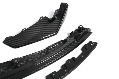 Carbon fiber weave detail on the CSL style front lip and corner splitter