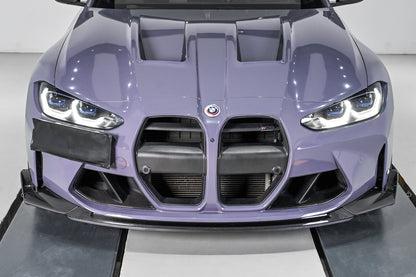 BMW G82 M4 front bumper fitted with the CSL style carbon fiber front lip and corner splitters