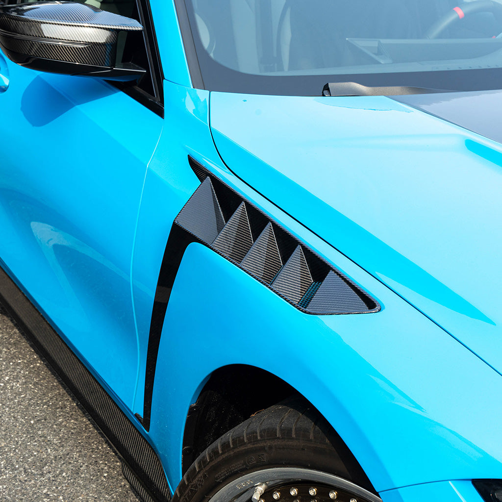 BMW G80 M3 G82 M4 SQ style carbon fiber vented front fender installed on blue G80 M3