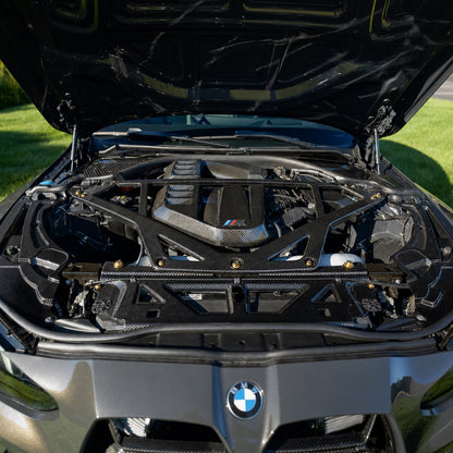 Front view of RAG's BMW G80 M3 with the full carbon fiber engine bay kit and CSL style strut brace