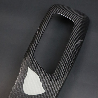 BMW G8X M2 M3 M4 Dry Carbon Side Seat Cover – single piece diagonal, film peeled showing 2x2 twill weave and gloss finish