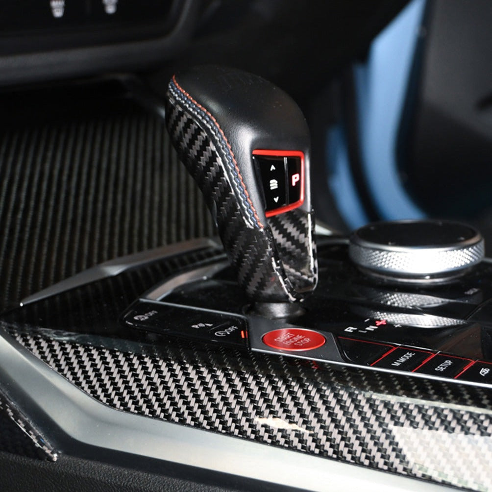 BMW G80 M3 G82 M4 carbon fiber gear selector cover installed on the M drive selector, gloss twill weave