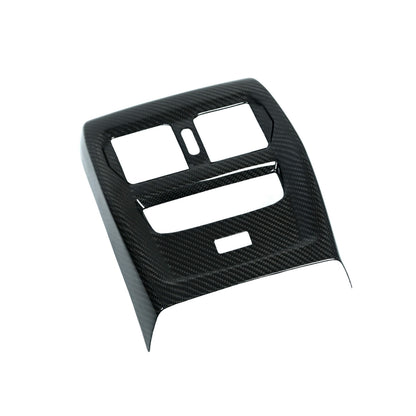 BMW M3 M4 carbon fiber rear vent trim three quarter view showing gloss carbon weave