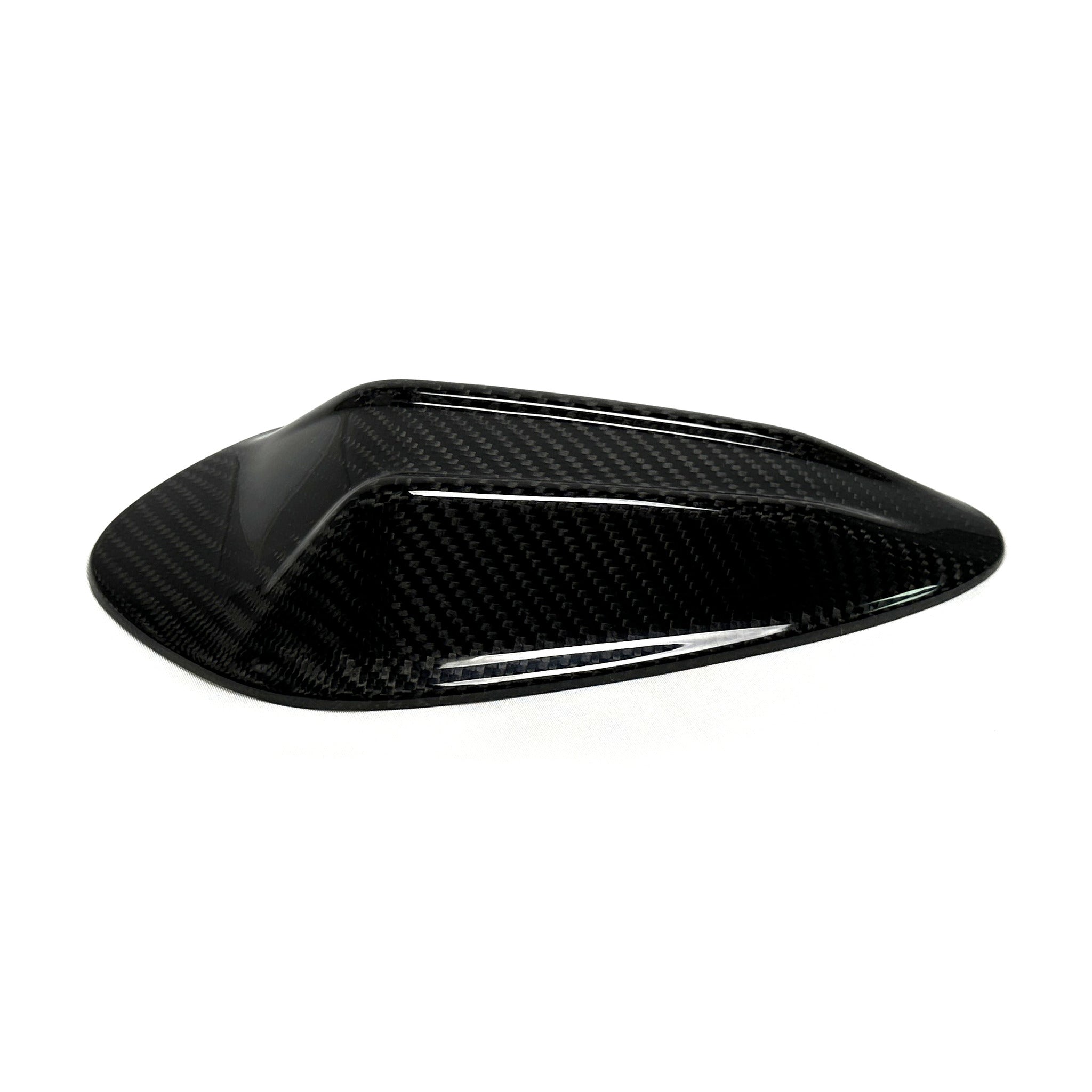 BMW G80 M3 and G82 M4 carbon fiber shark fin roof antenna cover, three quarter view of the gloss twill weave