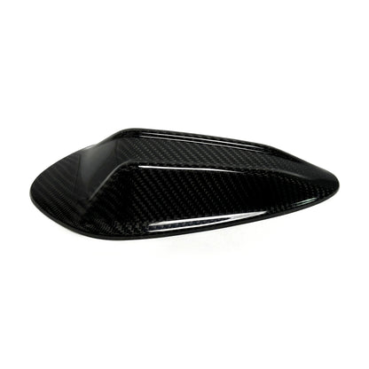BMW G80 M3 and G82 M4 carbon fiber shark fin roof antenna cover, three quarter view of the gloss twill weave