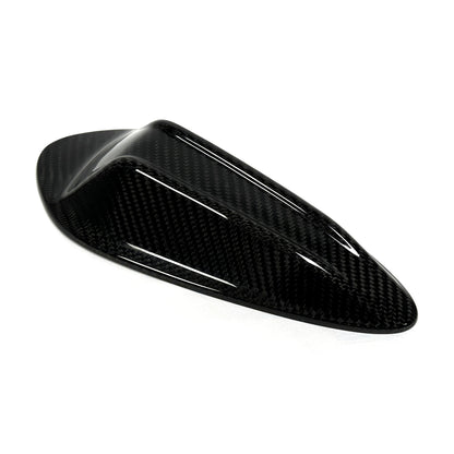 Carbon fiber shark fin antenna cover for BMW G80 M3 and G82 M4, side profile showing the raised centre crease