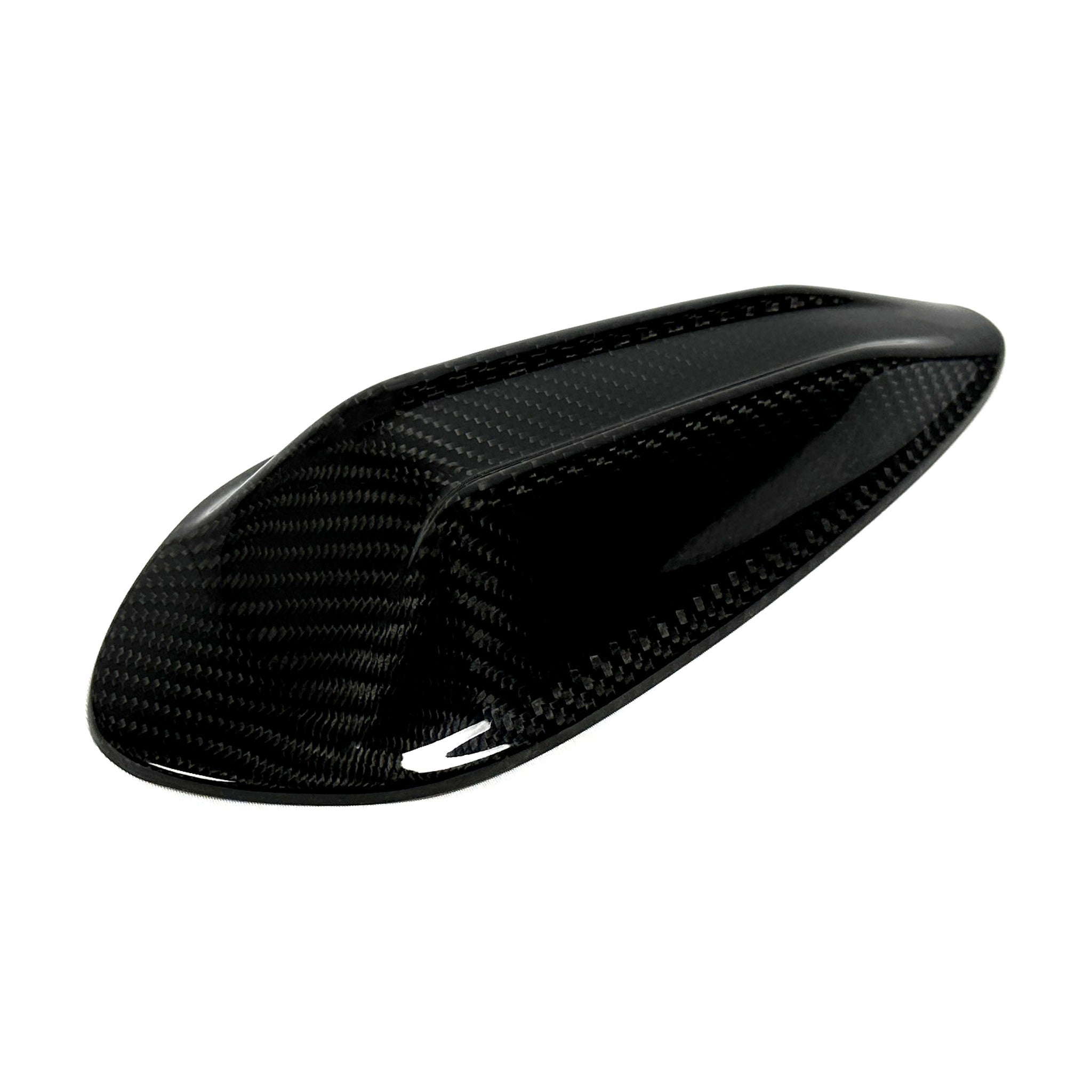 Rear three quarter view of the carbon fiber shark fin cover tapering to a fine point at the tail
