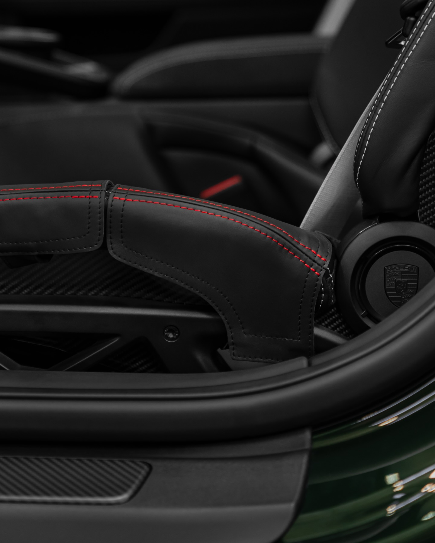 Porsche 992.2 GT3 bucket seat outer bolster protector, black leather and red stitching detail