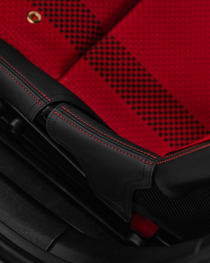 Porsche bucket seat red perforated center and black leather bolster protector with red stitching