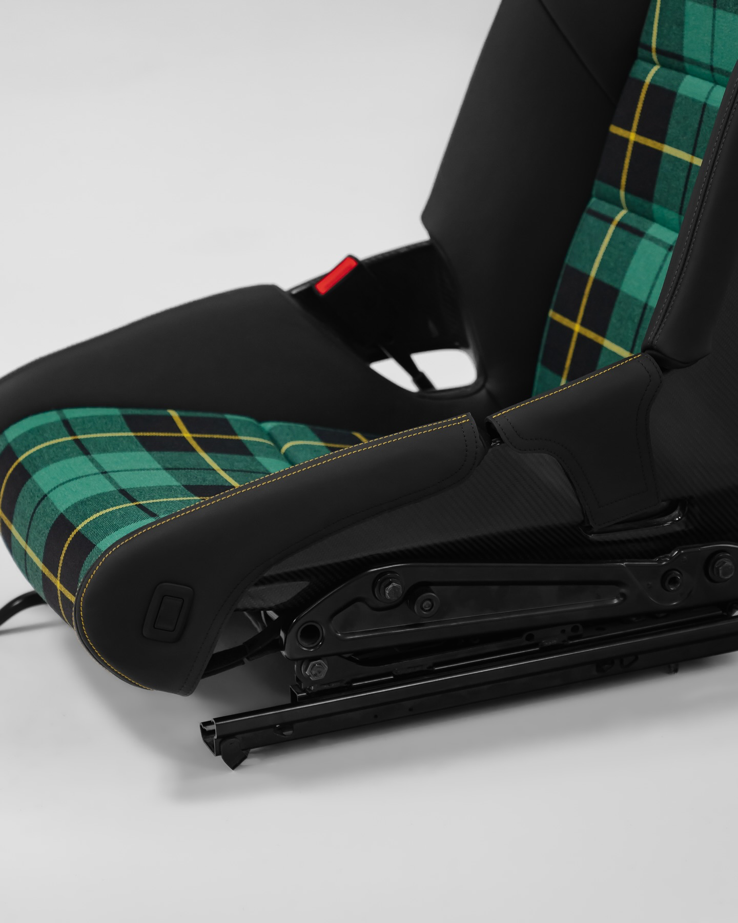 Porsche carbon bucket seat green tartan center with black leather bolster protector, yellow stitching