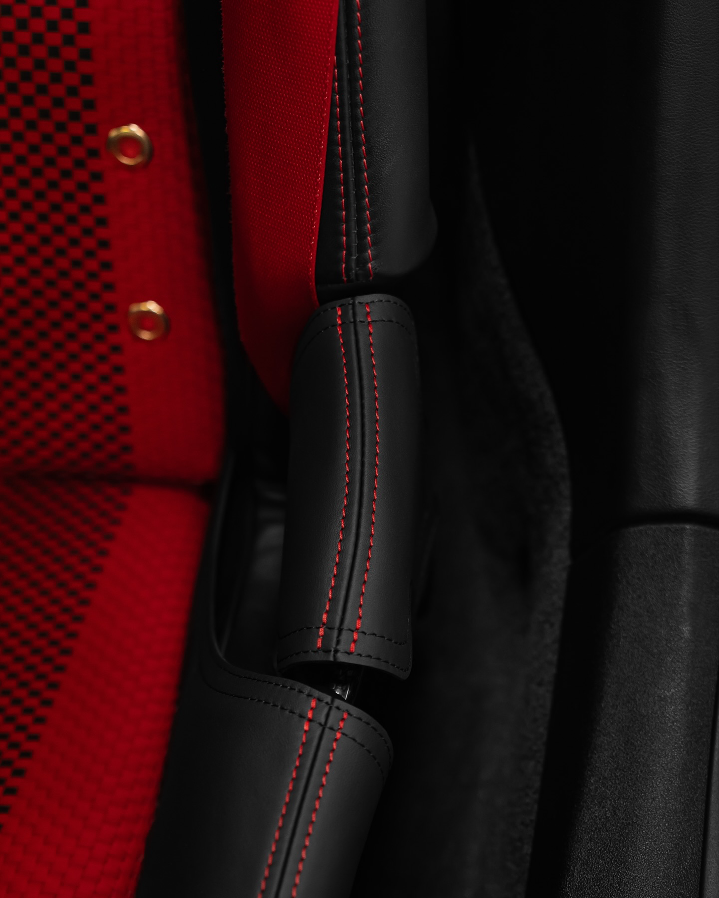 Porsche GT3 RS bucket seat side bolster protector, black leather and red stitching, installed