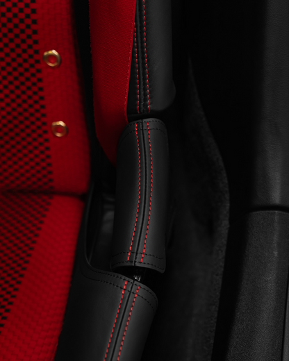 Porsche GT3 RS bucket seat side bolster protector, black leather and red stitching, installed